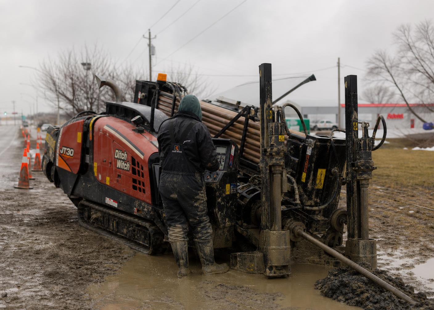 Directional drill operator at work on an underground utility project